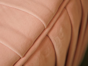 Pink pleated club chair
