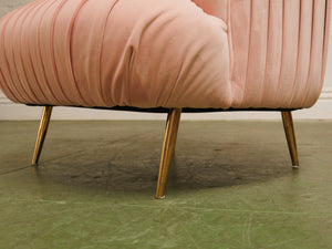 Pink pleated club chair
