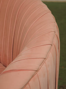 Pink pleated club chair