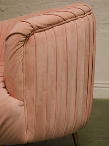 Pink pleated club chair