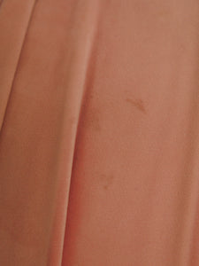 Pink pleated club chair