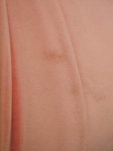 Pink pleated club chair