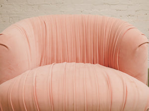 Pink pleated club chair