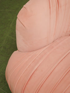 Pink pleated club chair