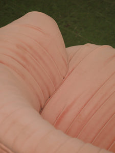 Pink pleated club chair