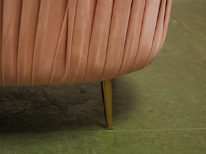Pink pleated club chair