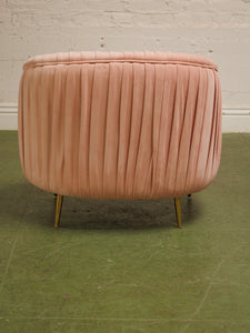 Pink pleated club chair