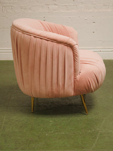 Pink pleated club chair