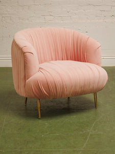 Pink pleated club chair
