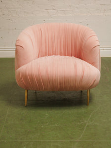 Pink pleated club chair