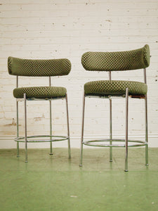 Pair of green checker counter stools in chrome