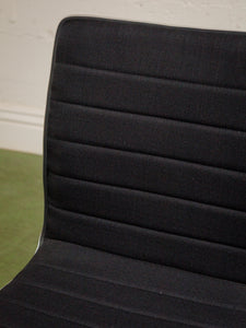 Armless Ribbed Swivel Office Chair in Black Upholstery