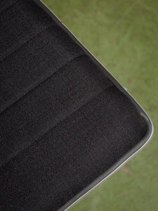 Armless Ribbed Swivel Office Chair in Black Upholstery