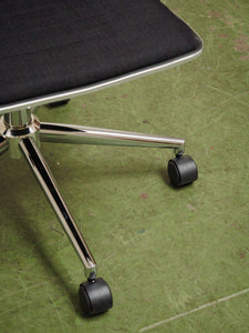 Armless Ribbed Swivel Office Chair in Black Upholstery