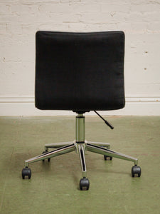 Armless Ribbed Swivel Office Chair in Black Upholstery