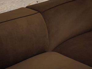 Dark green three-piece modular sectional corner sofa