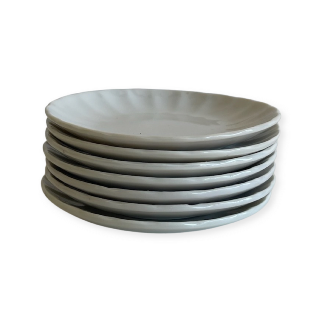 Set of 7 mini porcelain Plates